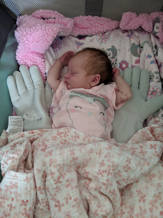 Abigail skips the bassinet using The Zaky HUG, in Sugar Land, Texas