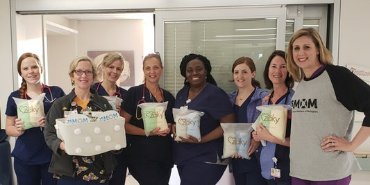 Donation from Jersey Shore Mothers of Multiples and Nurtured by Design to Monmouth Medical center NICU and to Jersey Shore NICU